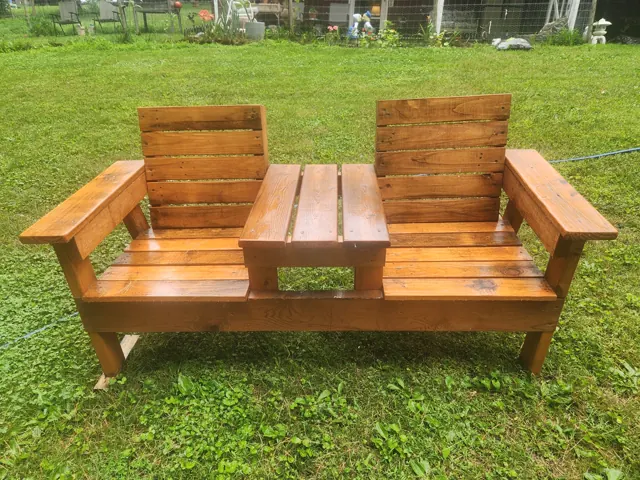 Reddish-brown twin-seat outdoor chair with center table