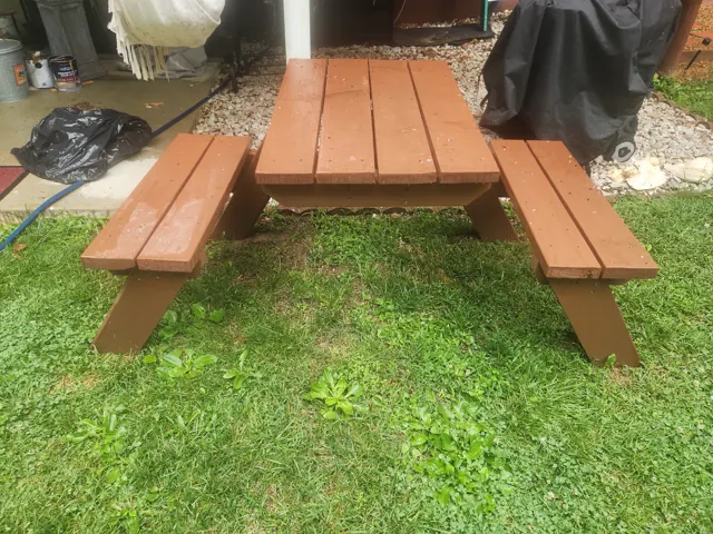 Finished reddish-brown outdoor table