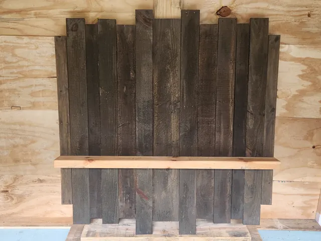 Dark walnut finish shown on a completed wall shelf